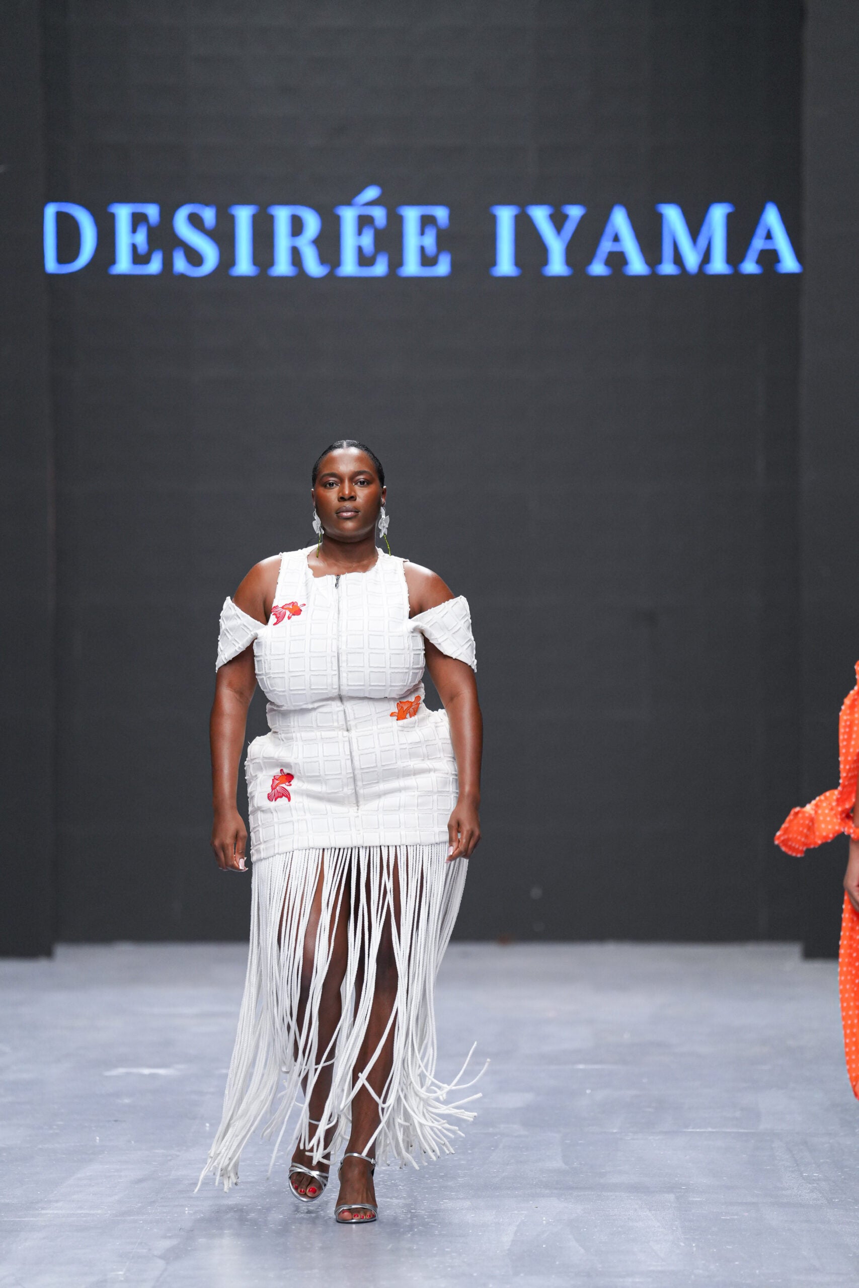 All the Trends in Lagos Fashion Week: Bubble Hems, Bold Metallics, And Kitschy Florals