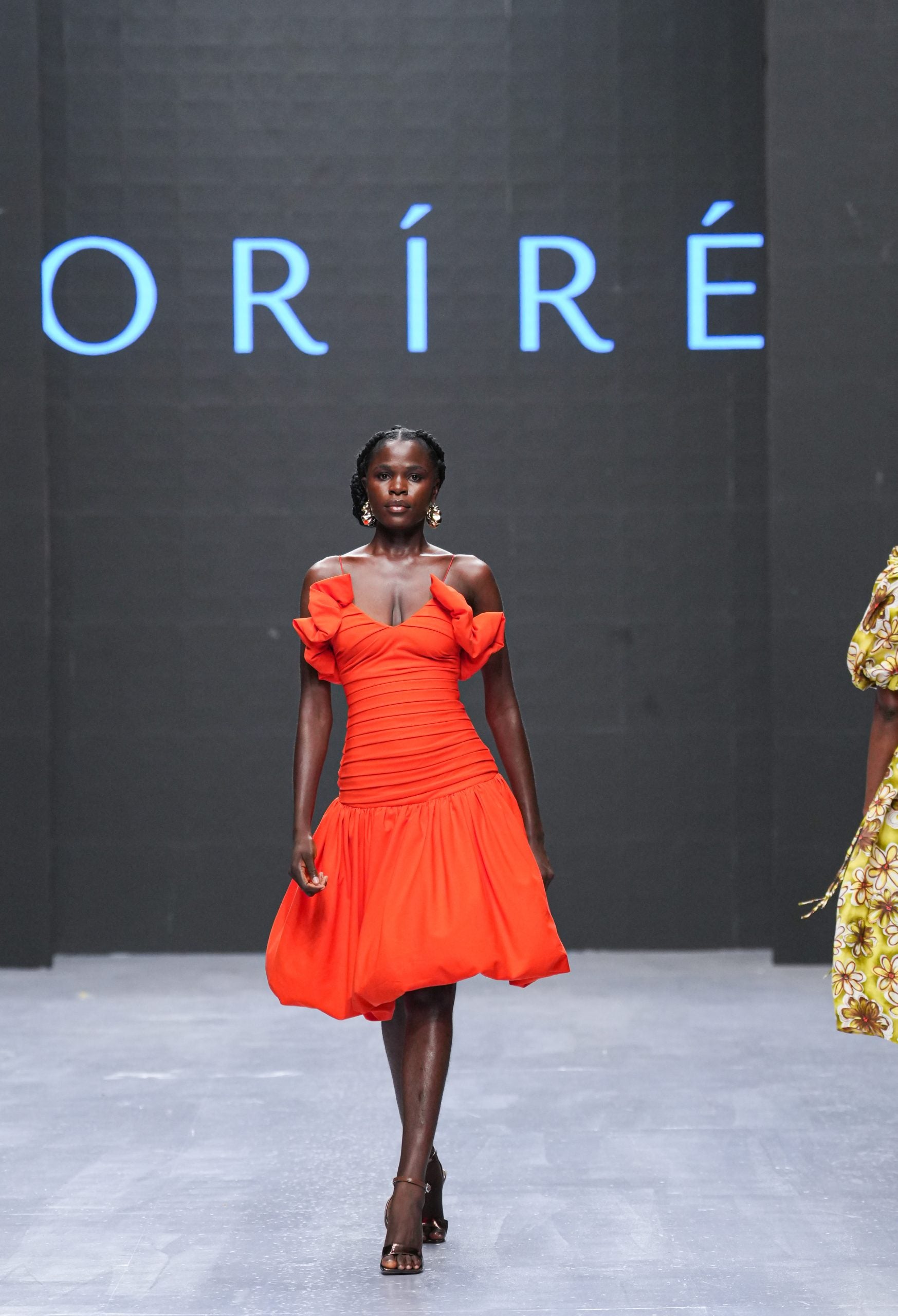 All the Trends in Lagos Fashion Week: Bubble Hems, Bold Metallics, And Kitschy Florals